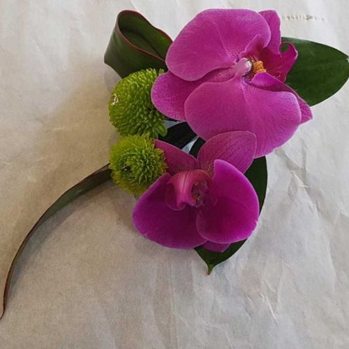 ORCHID AND SHAMROCK BUTTONHOLE