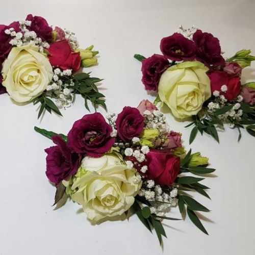 ROSE AND LISIANTHUS BUTTONHOLES
